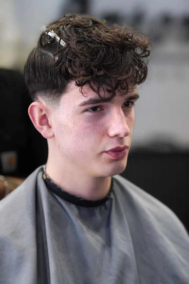 Antonio's Male Grooming, Bromley. A curly fringe, freshly cut.