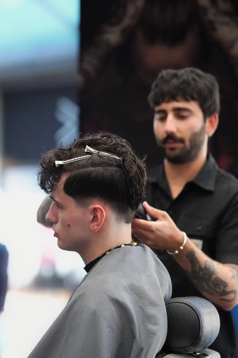 Antonio's Male Grooming, Bromley. The barber finishes a textured crop.