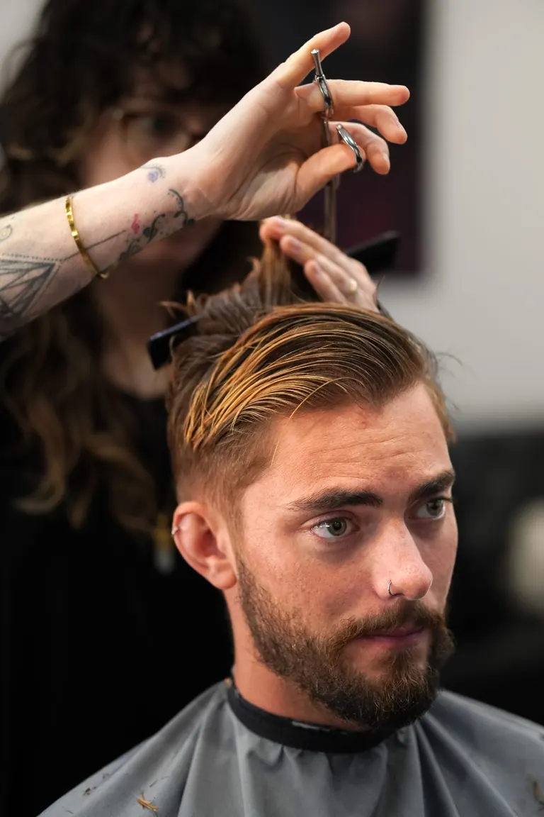 Antonio's Male Grooming, Bromley. Scissors over a swept-back top.