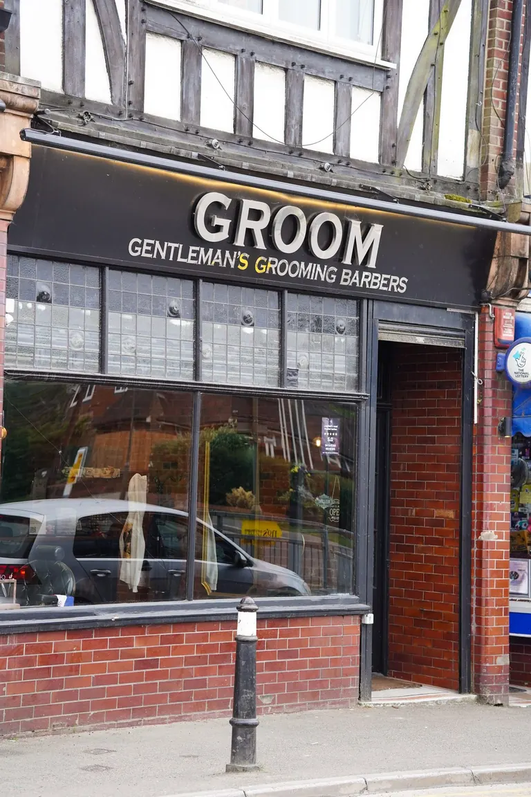 Groom Barbers, Lingfield, Surrey. The Groom Barbers shopfront on the high street in Lingfield.