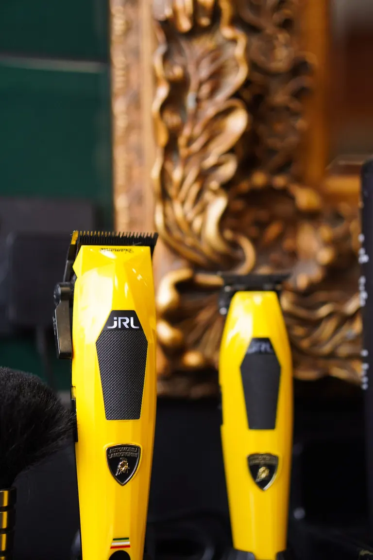 Groom Barbers, Lingfield, Surrey. Yellow clippers lined up at the station.